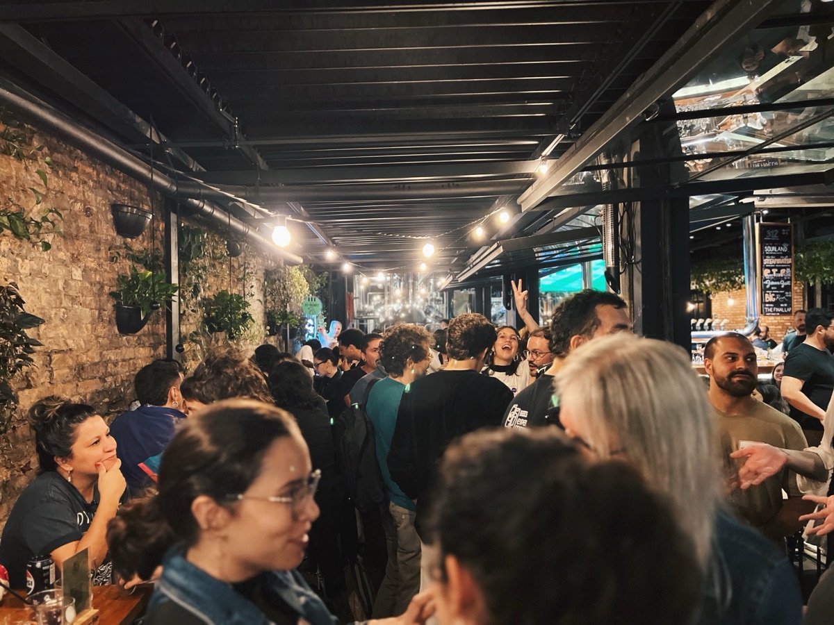 Researchers connecting at a People of Research event