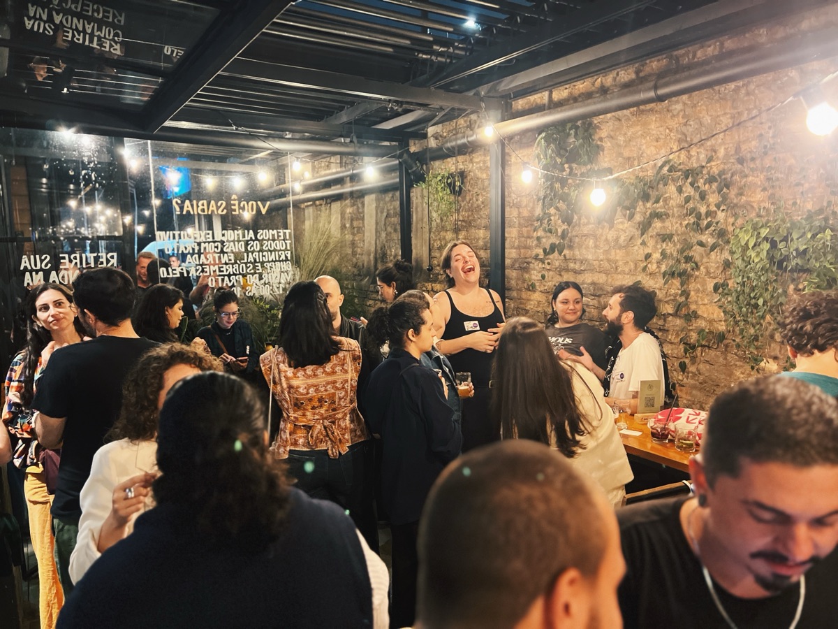 Researchers connecting at a People of Research event